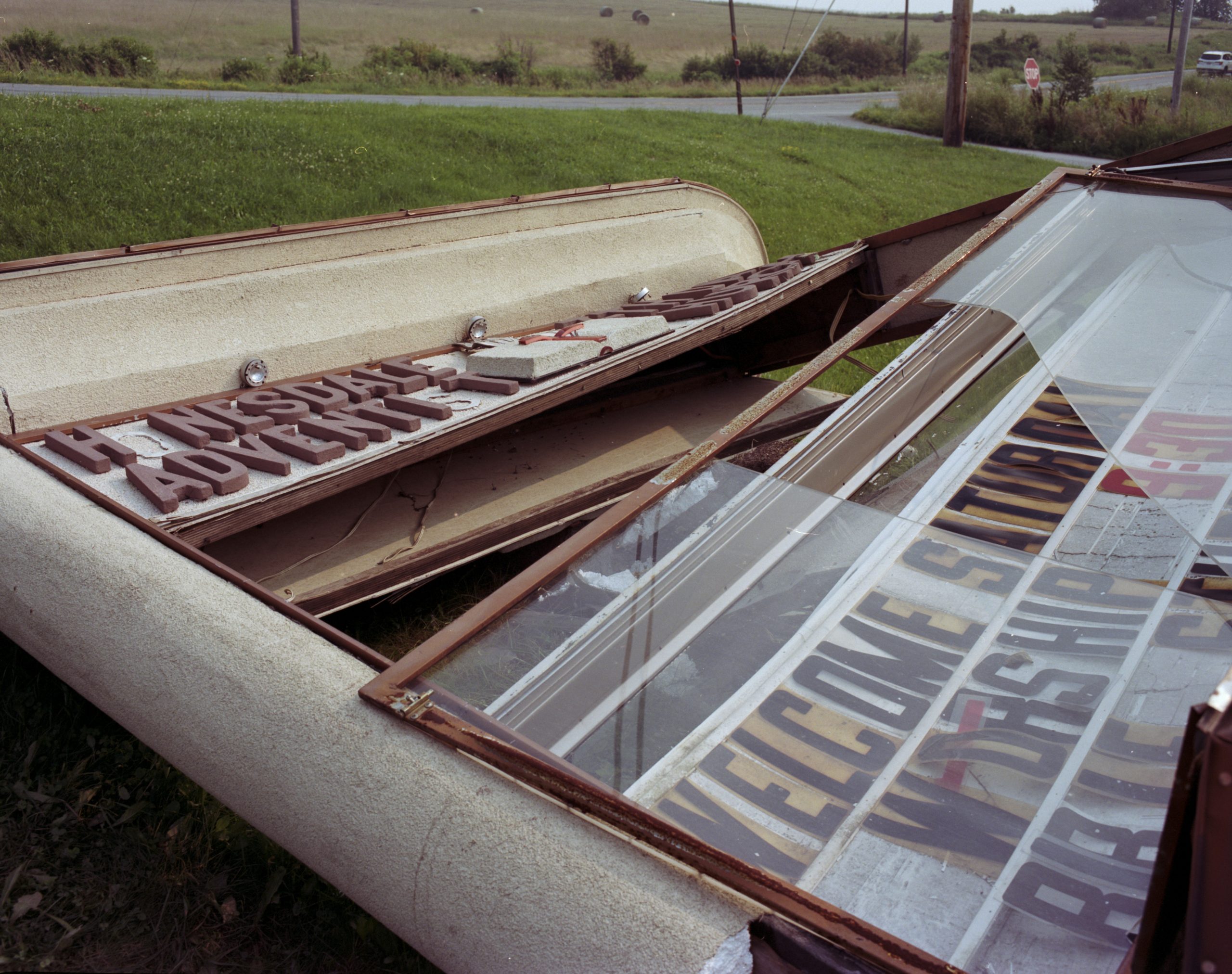Smashed Sign, Honesdale Adventist Church. Photo by Krystal Grow, 2021